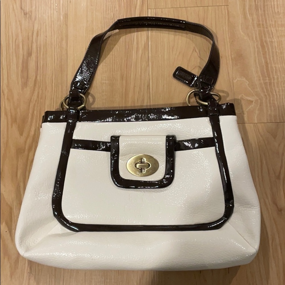 White and brown coach purse